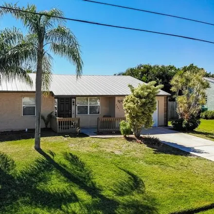 Buy this 4 bed house on 2321 Southeast Merrill Road in Port Saint Lucie, FL 34952