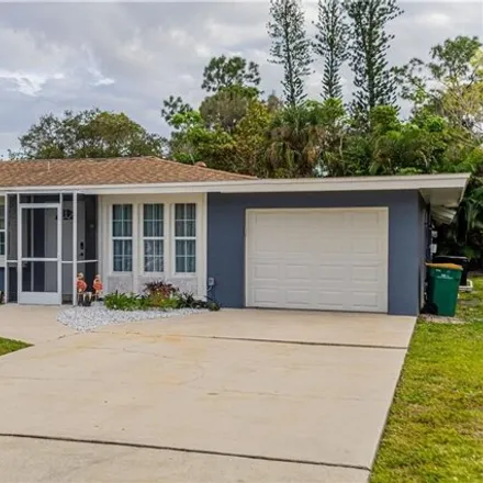 Rent this 3 bed house on 1063 Bluebird Street in East Naples, FL 34104