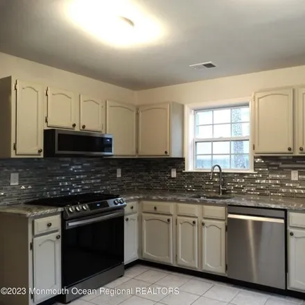 Rent this 3 bed townhouse on 540 Woodbine Lane in Lakewood Township, NJ 08701