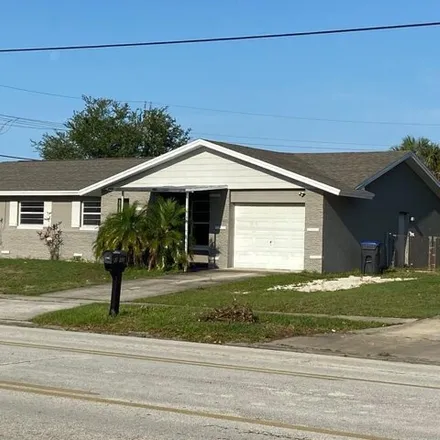 Buy this 4 bed house on 3172 Barna Ave in Titusville, Florida
