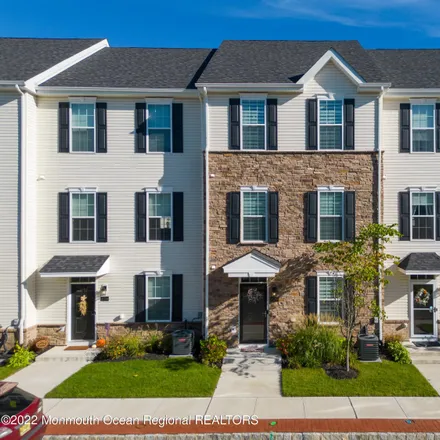 Buy this 3 bed townhouse on Celebration Boulevard in Brick Township, NJ 08723