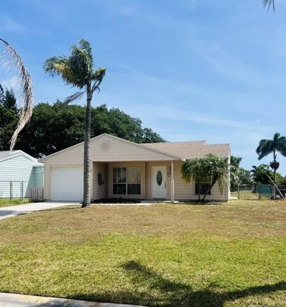 Buy this 2 bed house on 9078 Chrysanthemum Drive in Rainbow Lakes, Palm Beach County