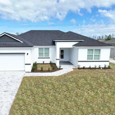 Rent this 4 bed house on 8494 Santa Cruz Drive in Charlotte County, FL 33981