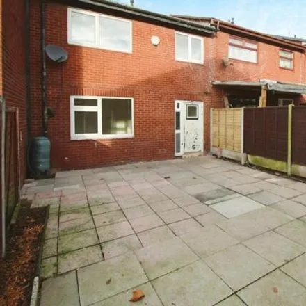 Rent this 2 bed townhouse on Oxford Court in Wigan, WN1 3TE
