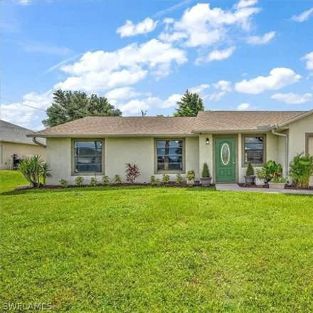 Buy this 3 bed house on 1407 NW 1st Ave in Cape Coral, Florida
