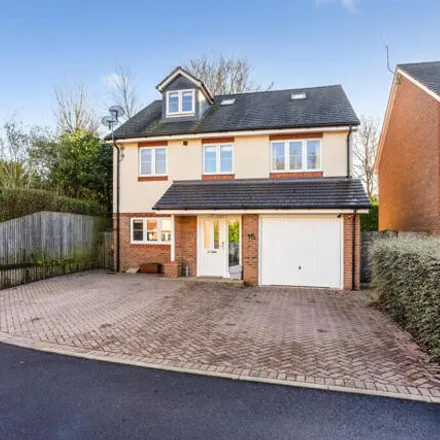 Buy this 4 bed house on Hawthorn Gardens in Caterham on the Hill, CR3 5HW