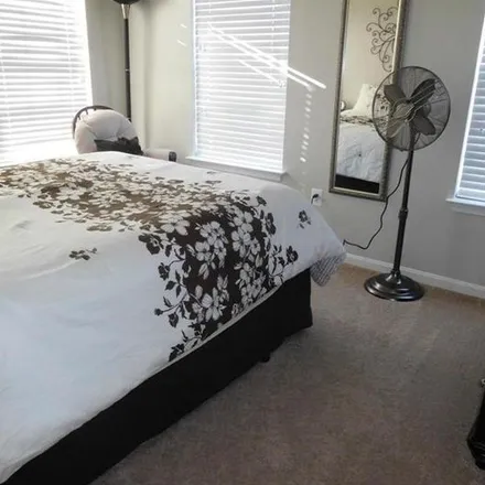 Rent this 3 bed apartment on 3823 Tonbridge Place in Lake Ridge, VA 22192