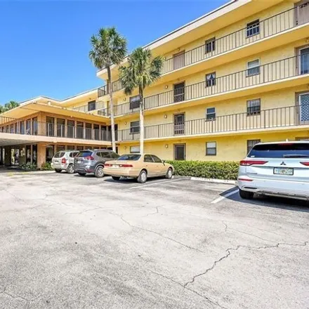 Buy this 2 bed condo on 9338 Southwest 8th Street in Sandalfoot Cove, Palm Beach County