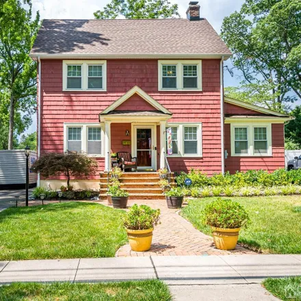 Buy this 4 bed house on 269 Grove Avenue in Metuchen, NJ 08840