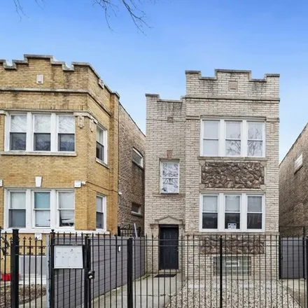 Buy this 8 bed house on 1052 North Springfield Avenue in Chicago, IL 60651