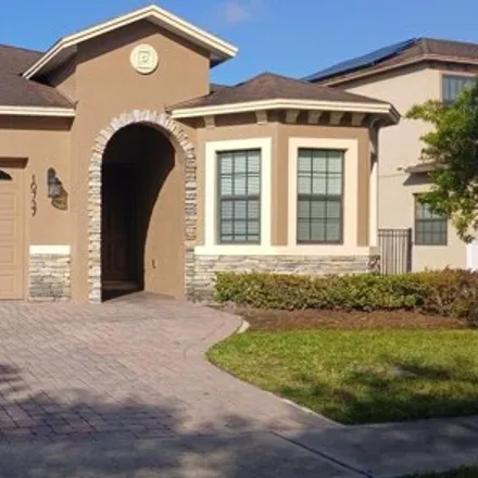 Rent this 4 bed house on 10737 Willow Ridge Loop in Orange County, FL 32825