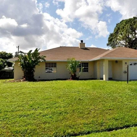 Buy this 3 bed house on 1178 Southeast Puritan Lane in Port Saint Lucie, FL 34983
