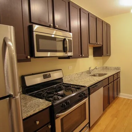 Rent this 2 bed apartment on 4056 N Harding Ave
