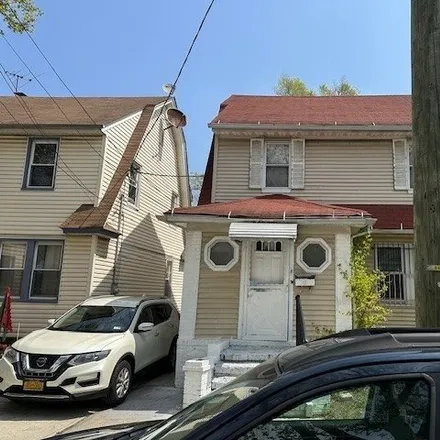 Buy this 3 bed house on 90-23 181st Street in New York, NY 11423