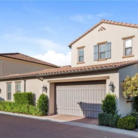 Rent this 3 bed condo on 129 Stallion in Irvine, California