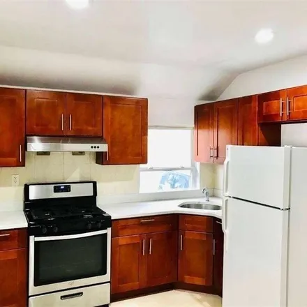 Rent this 2 bed apartment on 3-22 126th Street in New York, NY 11356