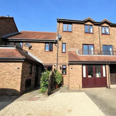 Buy this 4 bed townhouse on Waldren Close in Poole, BH15 1XS