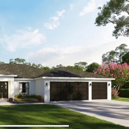 Buy this 4 bed house on 2062 Cogan Drive Southeast in Palm Bay, FL 32909