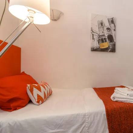 Rent this 2 bed room on Rua dos Sapateiros 207 in 1100-576 Lisbon, Portugal