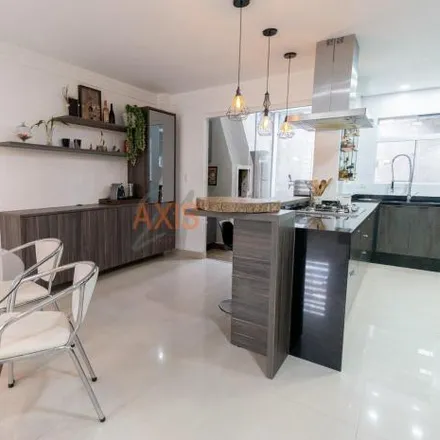 Buy this 3 bed house on Rua Deputado Fernando Ferrari 309 in São Lourenço, Curitiba - PR