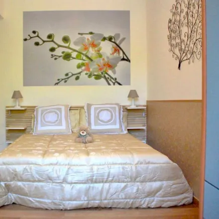 Rent this 3 bed room on Via Giovanni Battista Bodoni in 00153 Rome RM, Italy