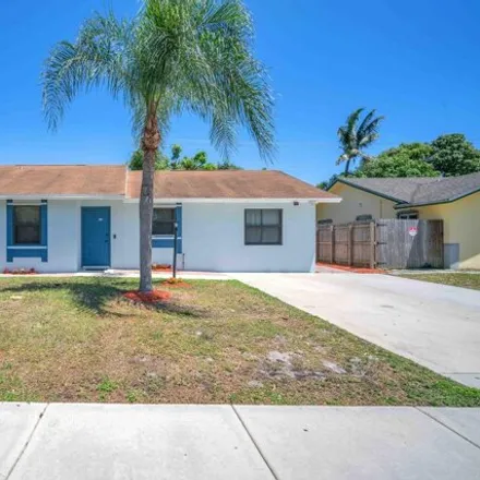 Buy this 3 bed house on 98 Northeast 45th Court in Tedder, Deerfield Beach