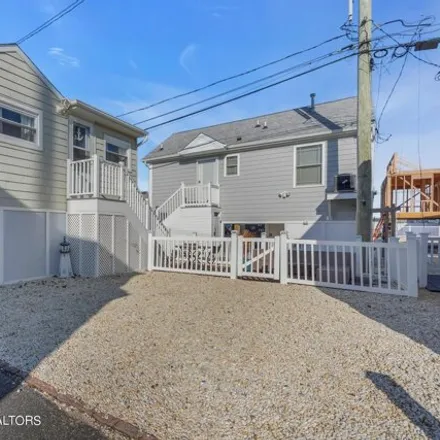Rent this 2 bed house on 112 West Tide Way in Monterey Beach, Toms River