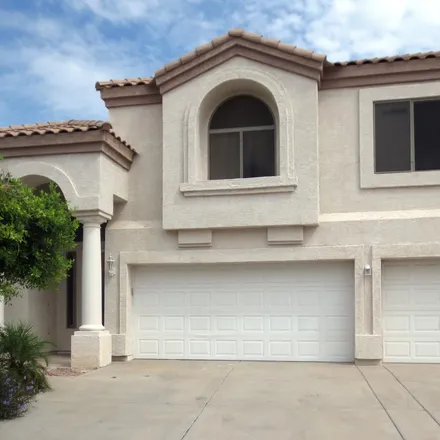 Rent this 4 bed house on 9442 East Lompoc Avenue in Mesa, AZ 85209