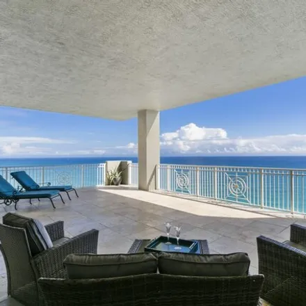 Buy this 3 bed condo on 5280 North Ocean Drive in Palm Beach Isles, Riviera Beach