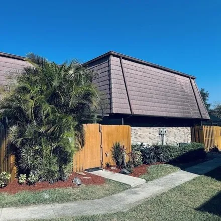 Rent this 3 bed house on 7662 Courtyard Run West in Palm Beach County, FL 33433