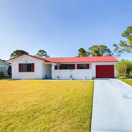 Buy this 2 bed house on 1375 Tallayrand Street Southeast in Palm Bay, FL 32909