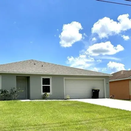 Rent this 4 bed house on Osmosis Drive in Palm Bay, FL 32909