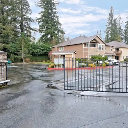 Buy this 2 bed townhouse on 21900 Southeast 242nd Street in Wilderness Village, Maple Valley