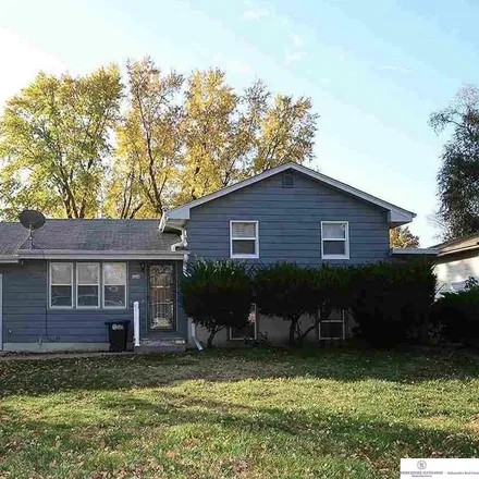 Buy this 4 bed house on 10921 Westover Road in Omaha, NE 68154