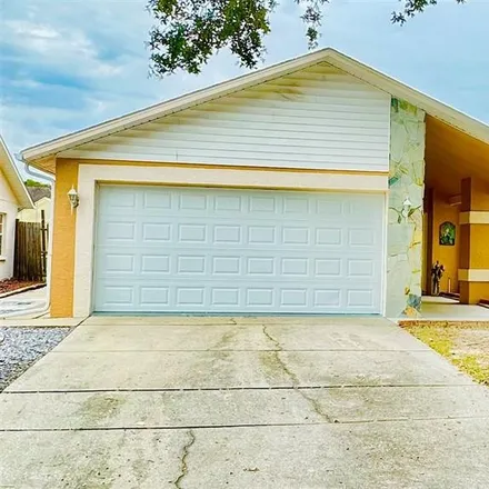 Buy this 3 bed house on 8771 Wolf Den Trail in Bayonet Point, FL 34668