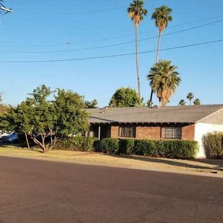 Rent this 3 bed apartment on 709 West Tuckey Lane in Phoenix, AZ 85013