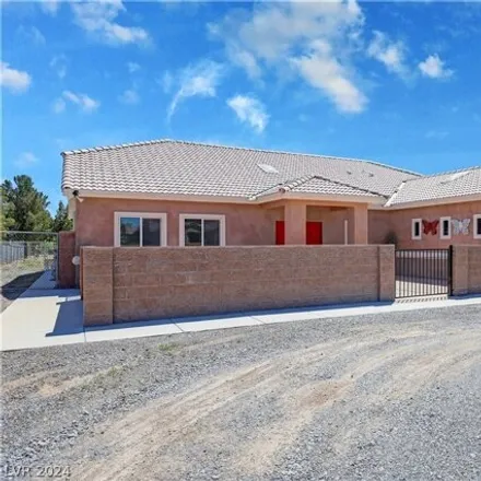 Buy this 3 bed house on 1739 Blackhorn Street in Pahrump, NV 89048