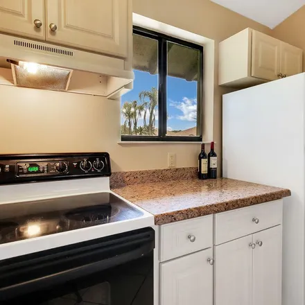 Rent this 2 bed apartment on Tournament Boulevard in Palm Beach Gardens, FL 33418