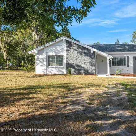 Buy this 2 bed house on 11375 Deep Creek Drive in Spring Hill, FL 34609