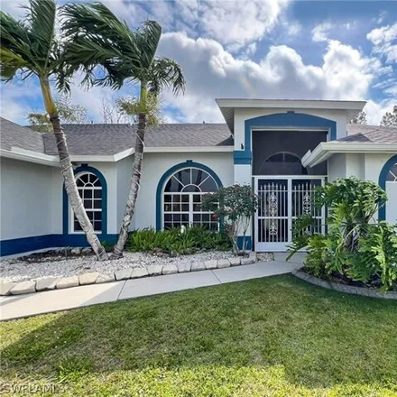 Buy this 4 bed house on 2549 Northwest 18th Avenue in Cape Coral, FL 33993