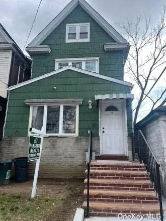 Buy this 5 bed house on 88-10 89th Avenue in New York, NY 11421