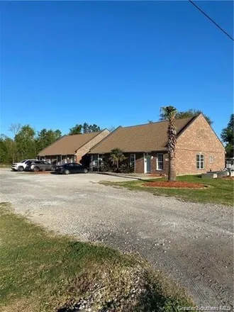 Rent this 2 bed house on 245 Armistead Lane in Moss Bluff, Calcasieu Parish