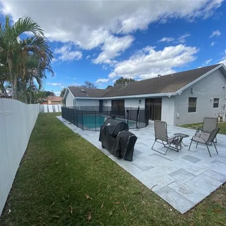 Rent this 4 bed house on 7094 Northwest 49th Place in Lauderhill, FL 33319