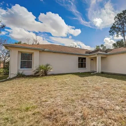 Rent this 3 bed house on 5054 Deltona Boulevard in Spring Hill, FL 34606