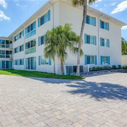 Rent this 2 bed condo on Palm Bay Villas in Gulf Shore Boulevard North, Naples