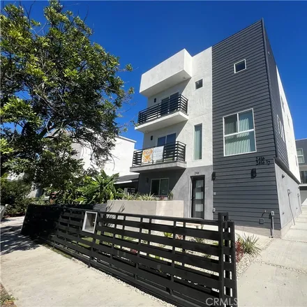 Rent this 4 bed townhouse on 2408 Carmona Avenue in Los Angeles, CA 90016