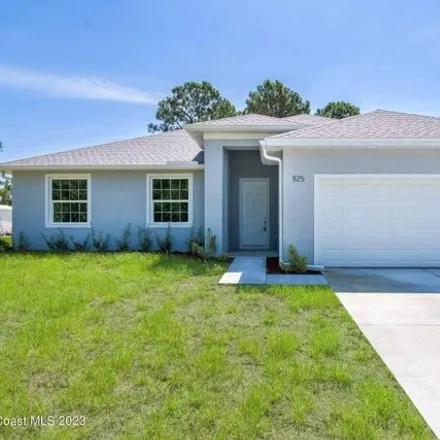 Buy this 4 bed house on 839 Upland Avenue Southeast in Palm Bay, FL 32909