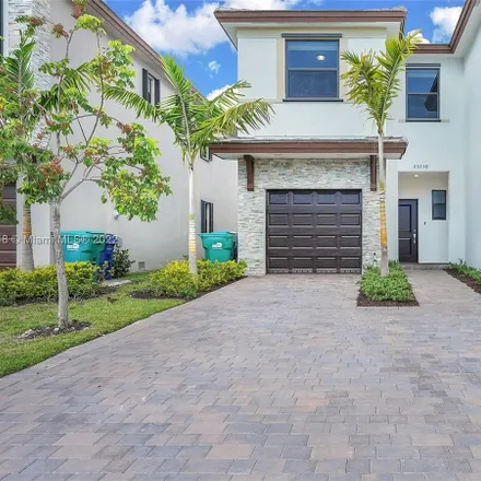 Rent this 3 bed townhouse on Southwest 107th Court in South Allapattah, Miami-Dade County