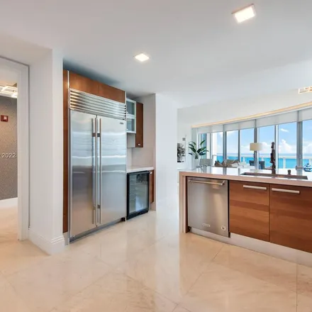 Rent this 3 bed apartment on 6000 Collins Avenue in Miami Beach, FL 33140