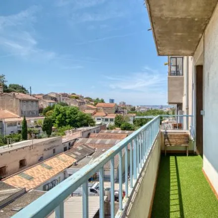 Rent this 7 bed apartment on 42 Boulevard Guigou in 13003 Marseille, France